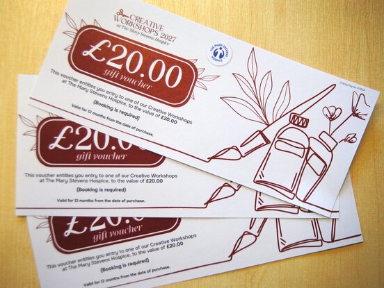 3 vouchers on table