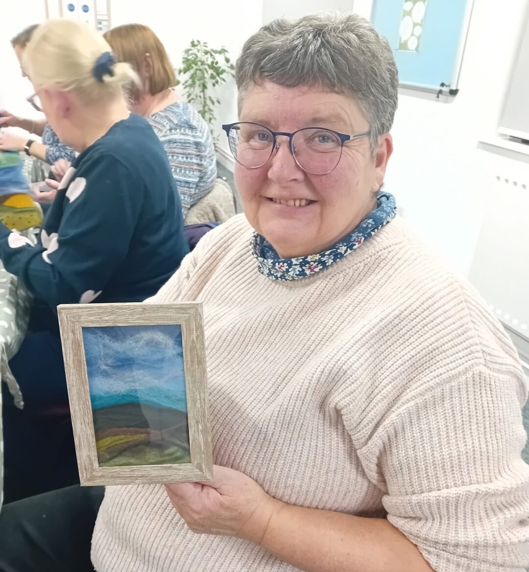 Someone holding frame