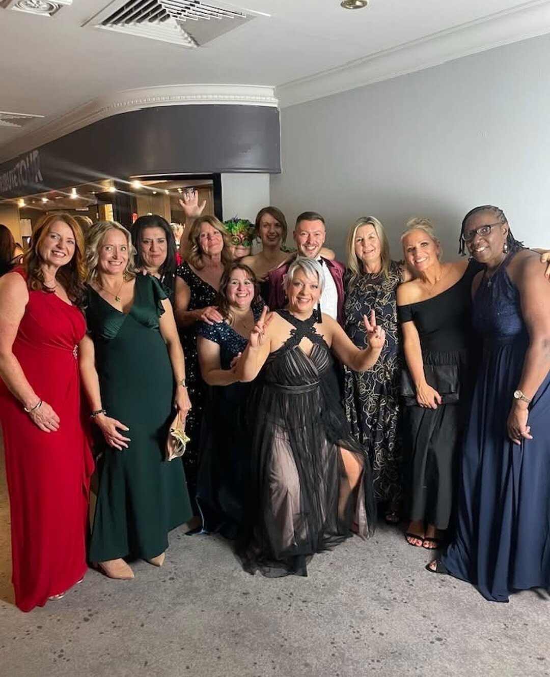 People enjoying masquerade ball