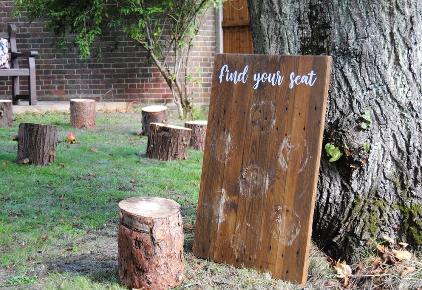A wooden sign reading 
