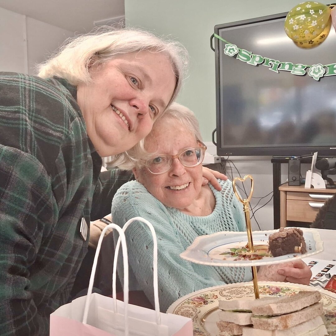 social worker, Esther, with a patient at Carer's Group spring high tea